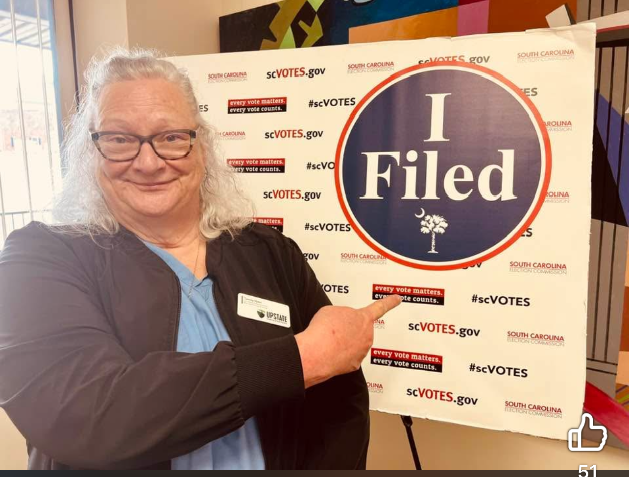 Tammy Hahn standing beside an I Filed sign at SC Votes